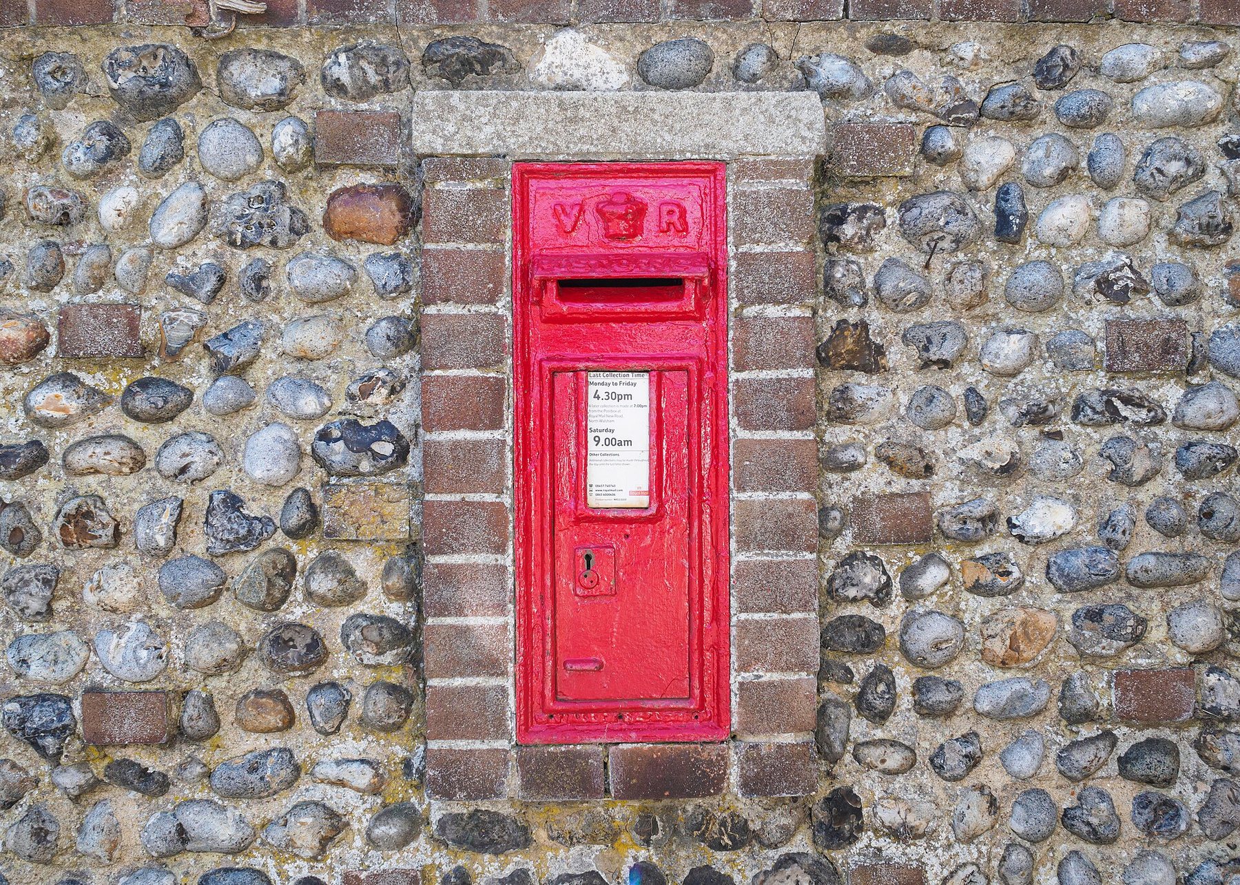 Book Red post box on a street