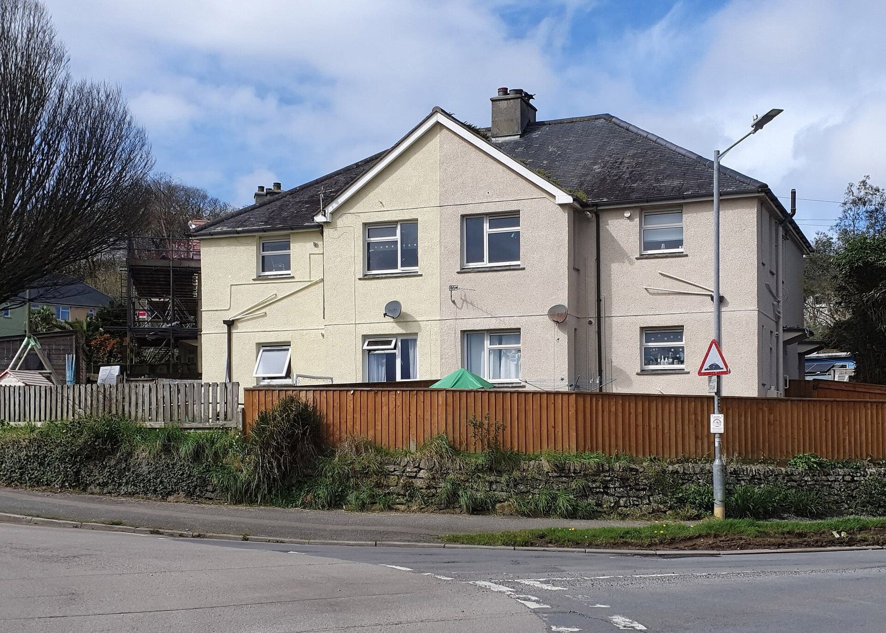 Semi-detached house with a front garden